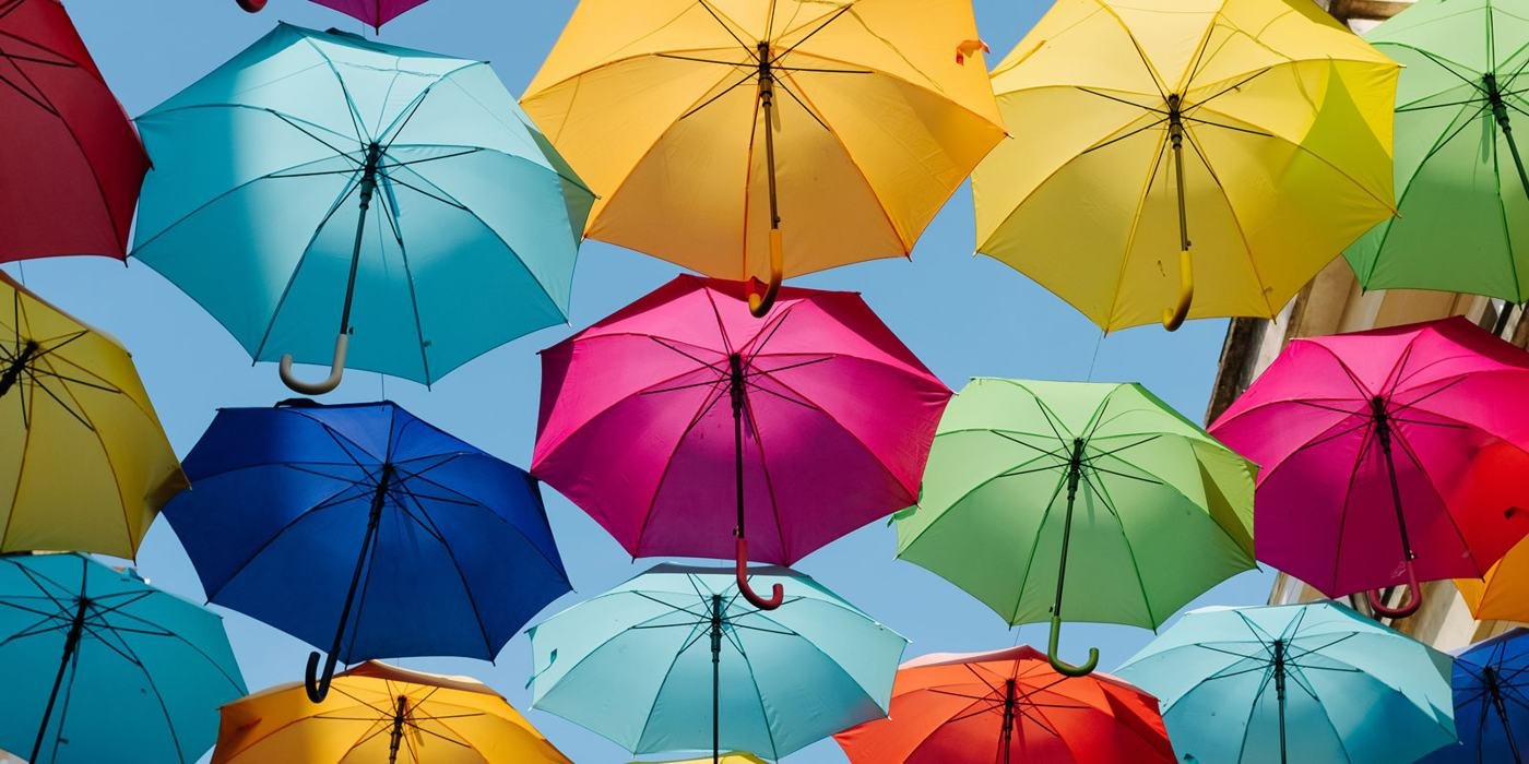 Bright umbrellas suspended over a street